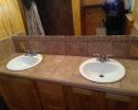 We have tiled over this double vanity bathroom sink for a truly beautiful effect! 
