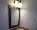 With accent tiling and a new vanity, this bathroom has been transformed! 